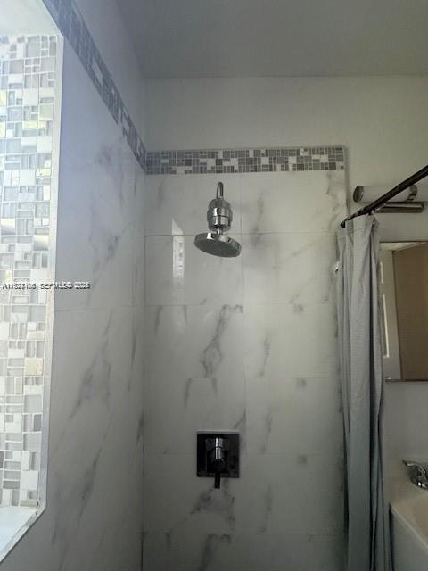 10070 Southeast East Bay Harbor Drive, Unit 70C Bay Harbor Islands, FL 33154 - Photo 8 of 17 a close view of a shower in kitchen