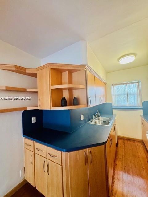 10070 Southeast East Bay Harbor Drive, Unit 70C Bay Harbor Islands, FL 33154 - Photo 10 of 17 a living room with a sink and furniture