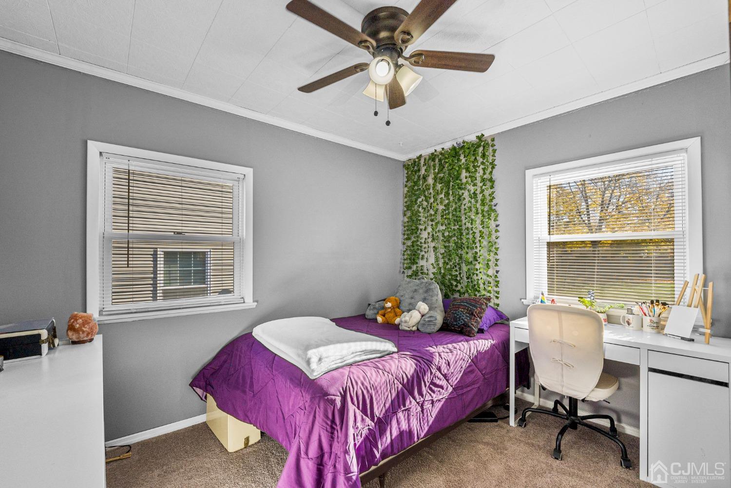 34 Walnut Street Edison, NJ 08817 - Photo 5 of 20 a bedroom with a bed and a window