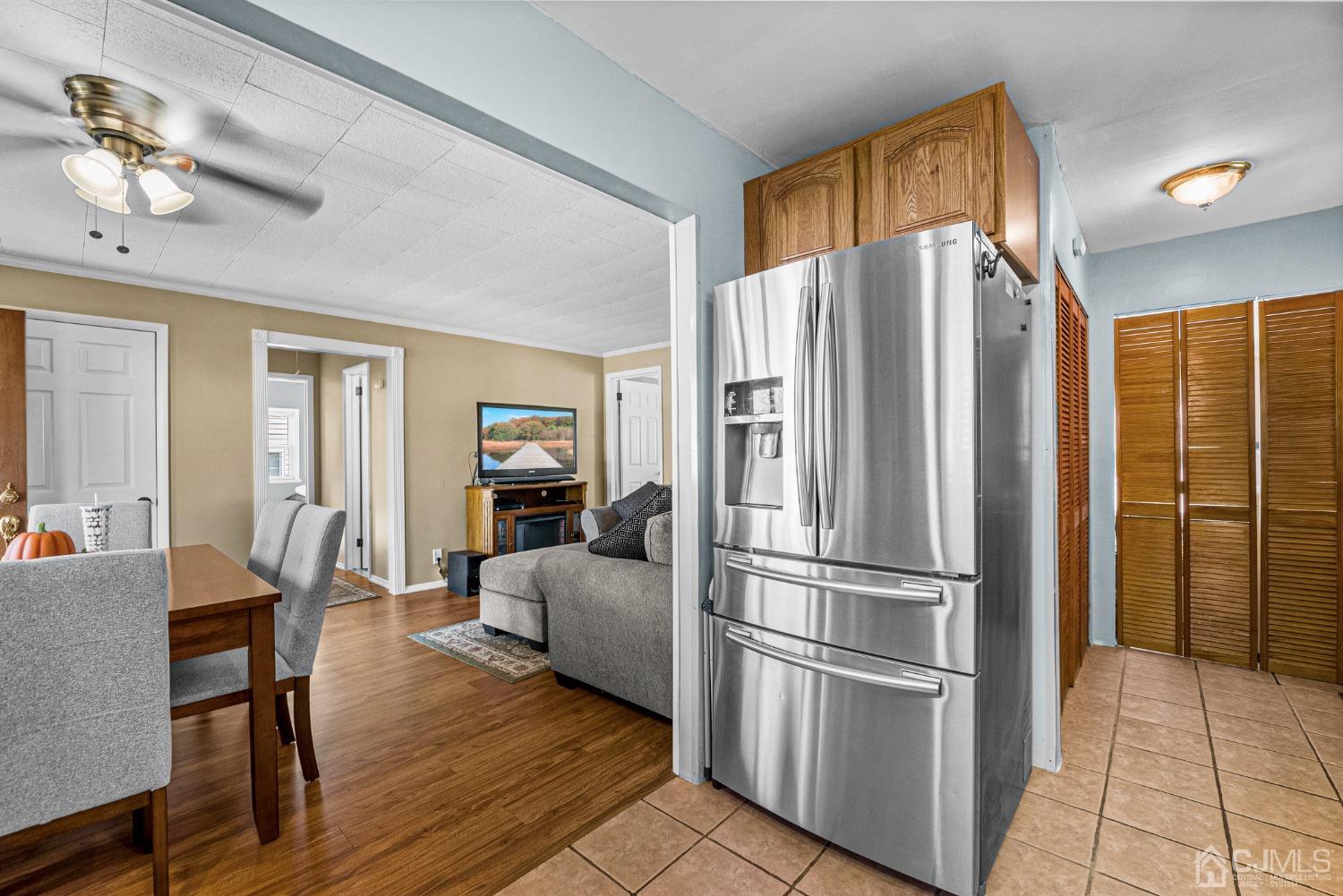 34 Walnut Street Edison, NJ 08817 - Photo 10 of 20 a kitchen with stainless steel appliances a refrigerator and microwave