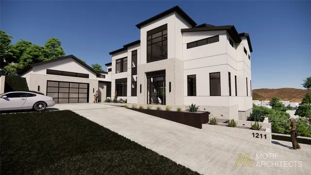 a front view of a house with yard and green space