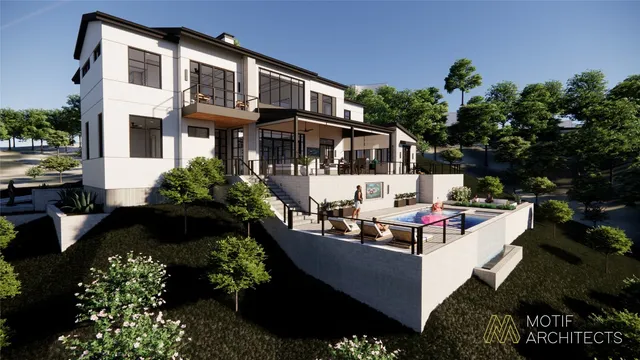 a view of a patio with table and chairs potted plants