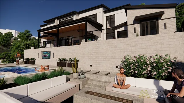 a view of a patio with couches table and chairs and potted plants