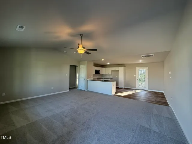 a view of a kitchen and a window