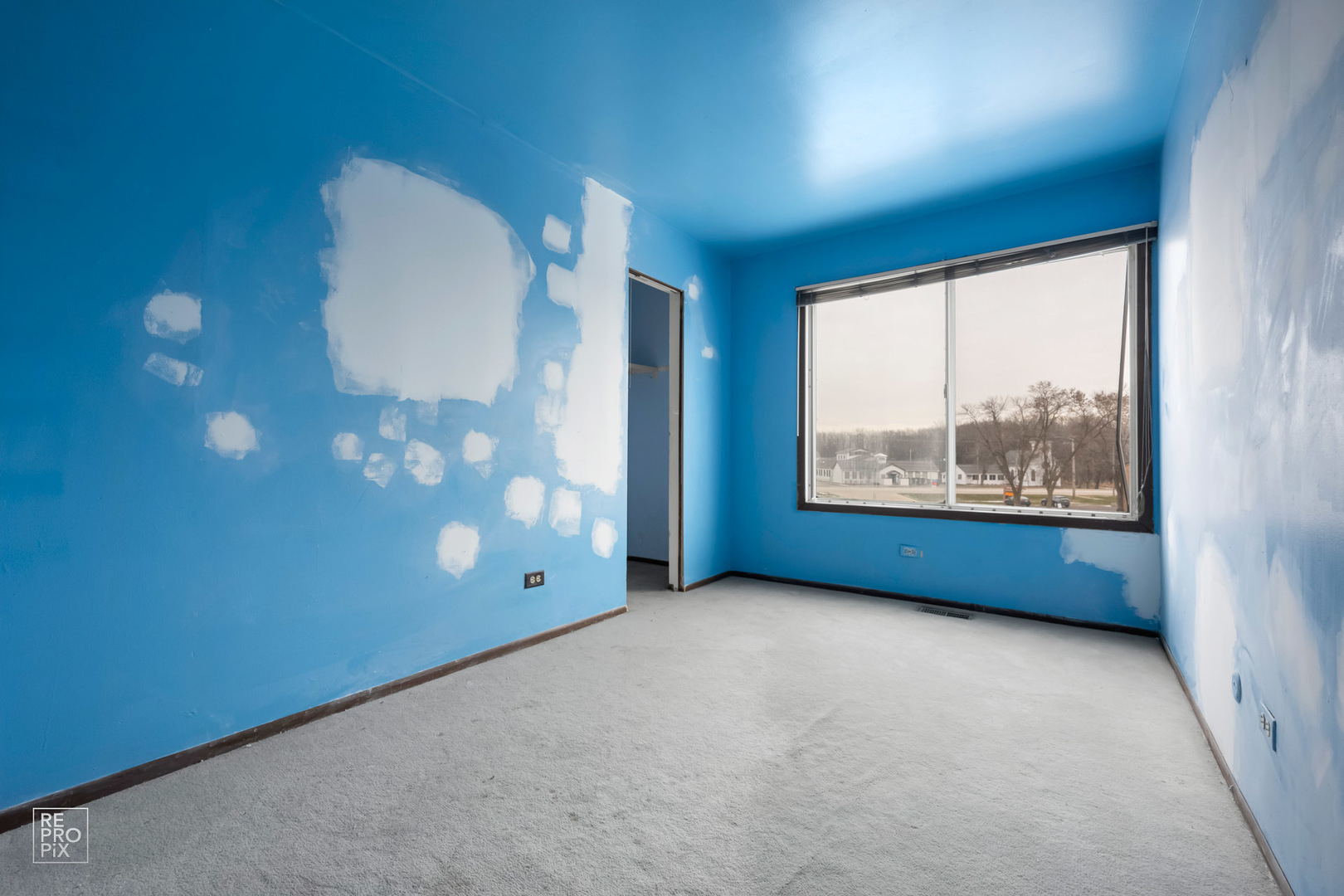 45 Churn Road Matteson, IL 60443 - Photo 13 of 14 an empty room with windows