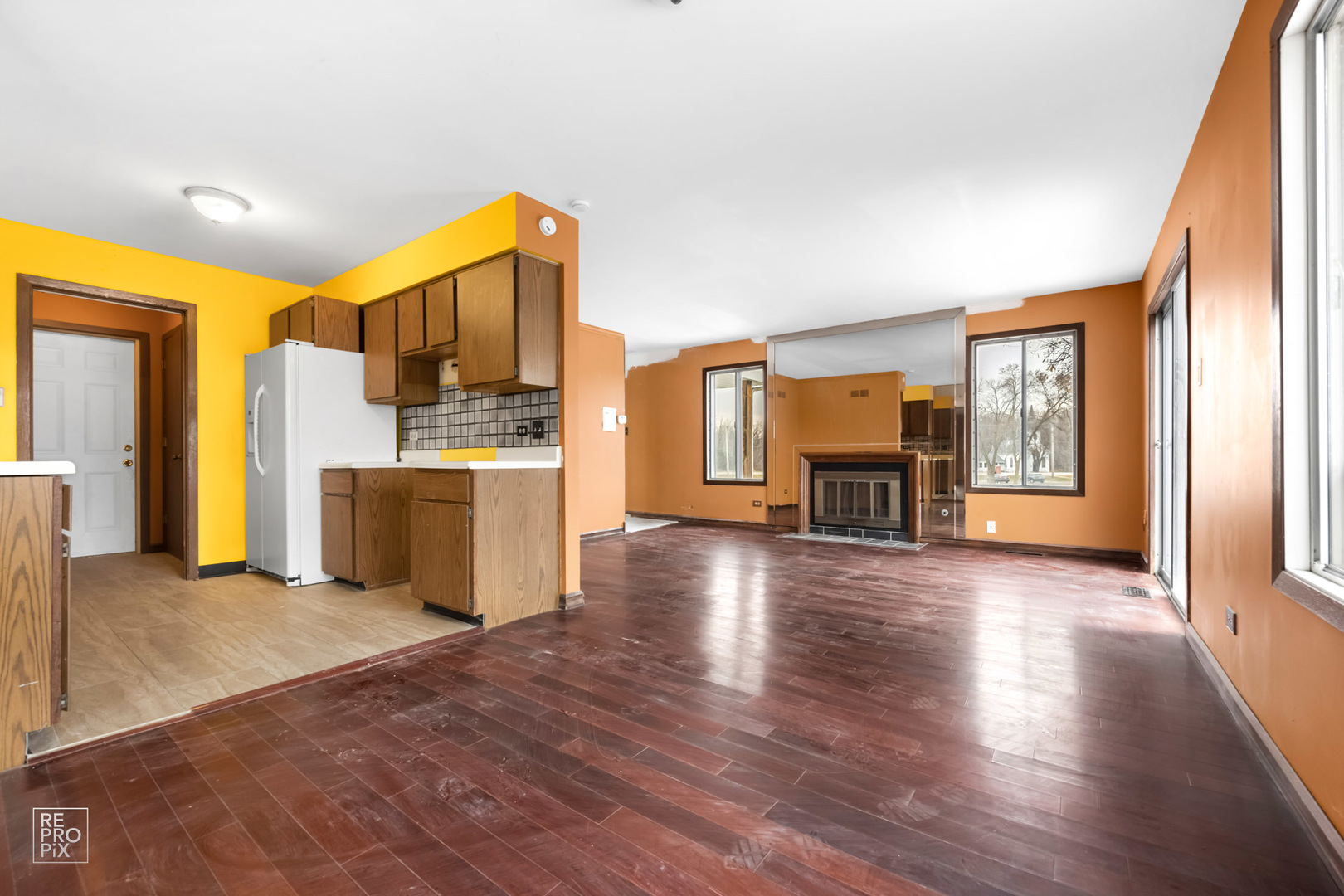 45 Churn Road Matteson, IL 60443 - Photo 6 of 14 a view of a kitchen with a sink and a refrigerator