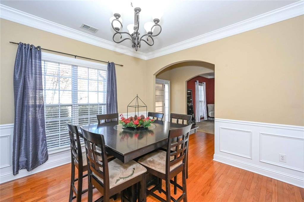 1024 Landon Drive Villa Rica, GA 30180 - Photo 12 of 50 a view of a dining room with furniture window and wooden floor