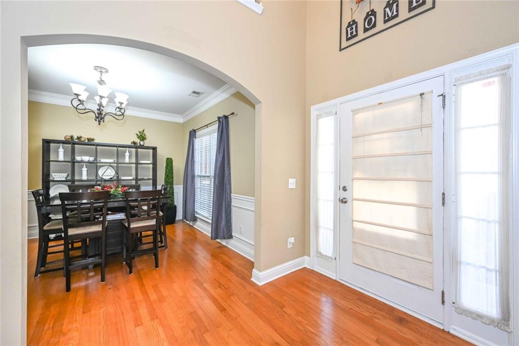 1024 Landon Drive Villa Rica, GA 30180 - Photo 13 of 50 a view of a livingroom with furniture a dinning room and livingroom with furniture