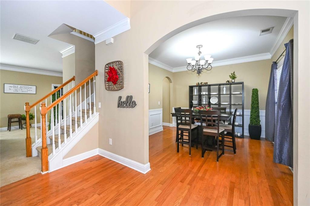 1024 Landon Drive Villa Rica, GA 30180 - Photo 14 of 50 a view of dining room with furniture and wooden floor