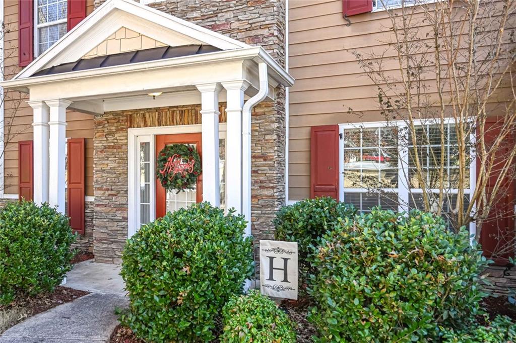 1024 Landon Drive Villa Rica, GA 30180 - Photo 2 of 50 a view of a building with potted plants