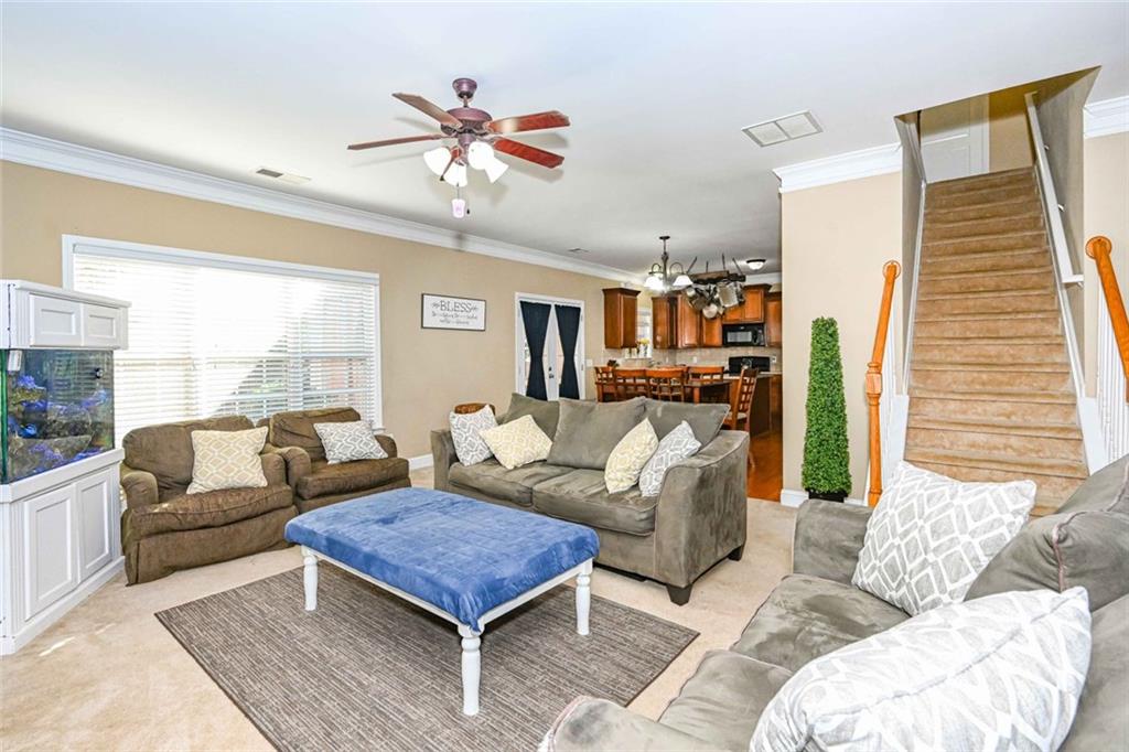 1024 Landon Drive Villa Rica, GA 30180 - Photo 24 of 50 a living room with furniture and a large window