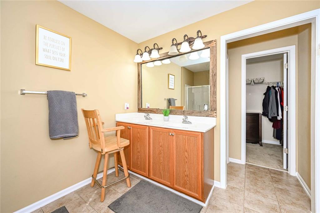 1024 Landon Drive Villa Rica, GA 30180 - Photo 32 of 50 a bathroom with a sink and a mirror