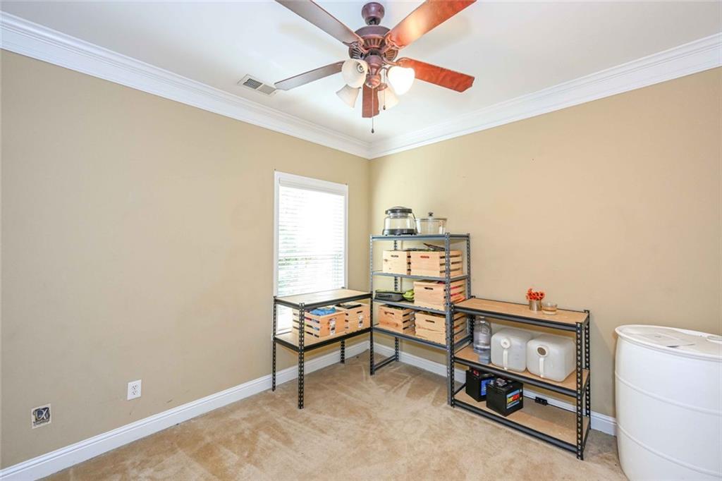 1024 Landon Drive Villa Rica, GA 30180 - Photo 40 of 50 a view of a workspace with furniture and a window