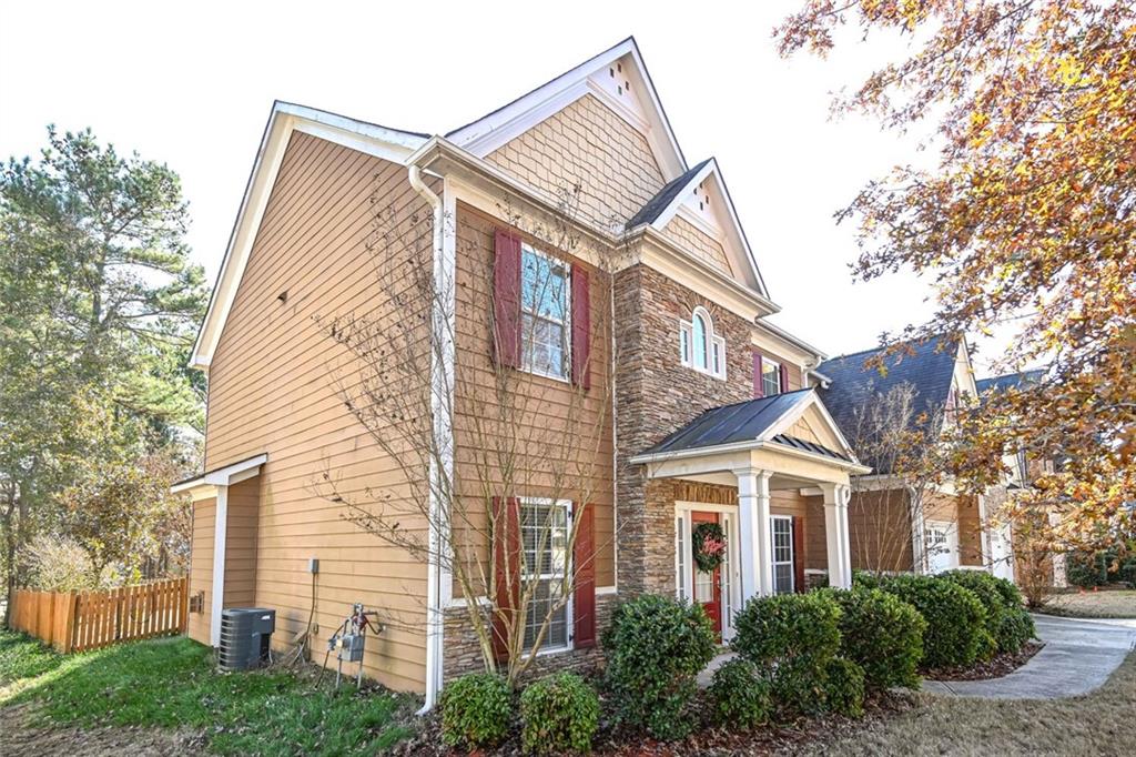1024 Landon Drive Villa Rica, GA 30180 - Photo 4 of 50 a front view of a house with a yard