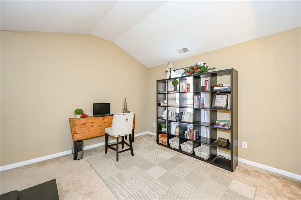 1024 Landon Drive Villa Rica, GA 30180 - Photo 41 of 50 a reading room with furniture and book shelf
