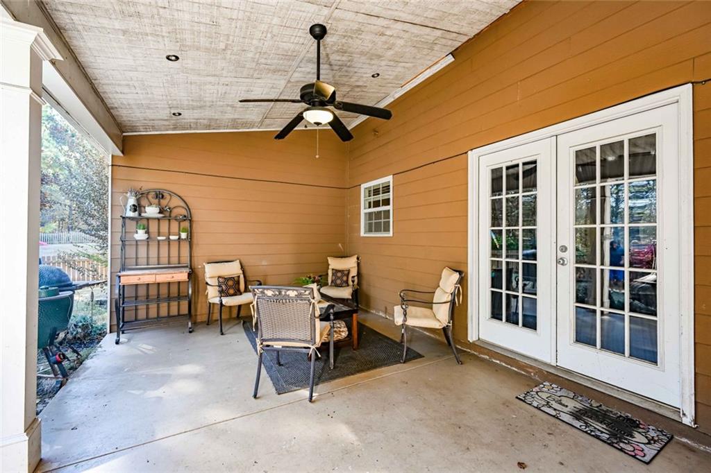 1024 Landon Drive Villa Rica, GA 30180 - Photo 46 of 50 a view of a patio with a table and chairs