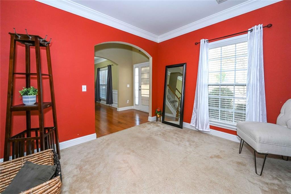1024 Landon Drive Villa Rica, GA 30180 - Photo 8 of 50 a view of a livingroom with furniture and staircase