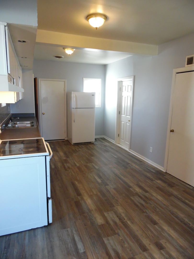 2300 Highway 23 Grand Ridge, IL 61325 - Photo 7 of 13 a view of a kitchen with wooden floor