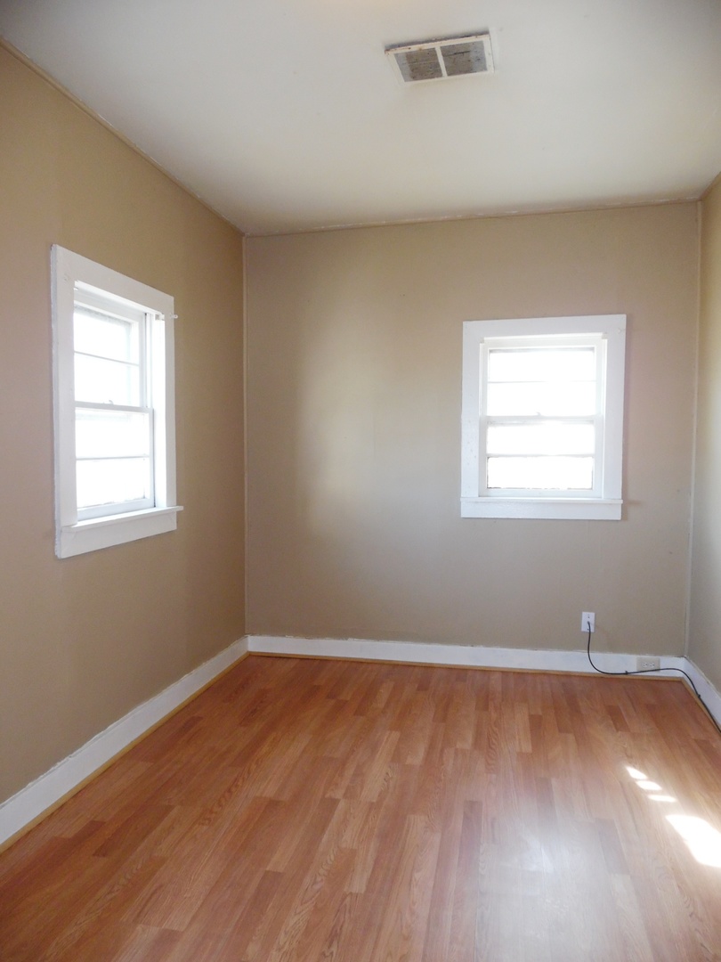 2300 Highway 23 Grand Ridge, IL 61325 - Photo 8 of 13 a view of a room with wooden floor and windows