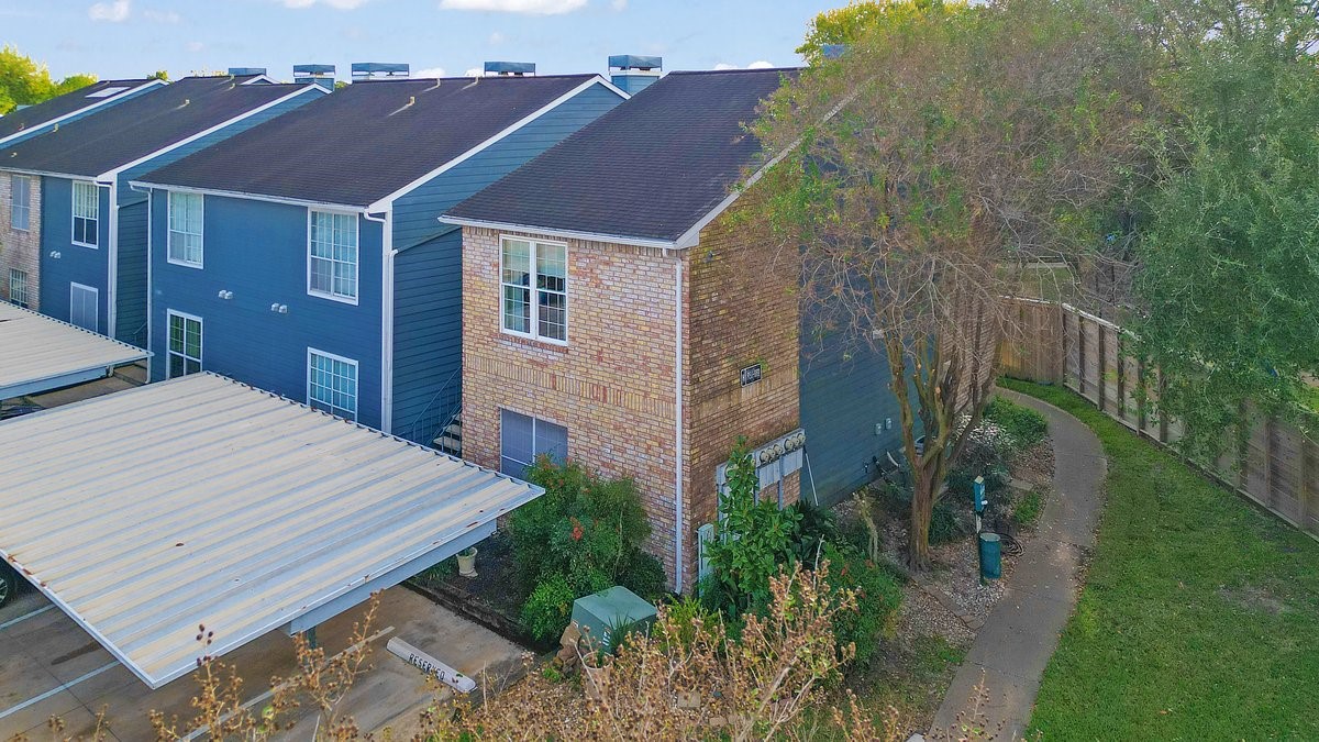 2323 Fairwind Drive, Unit 858 Houston, TX 77062 - Photo 20 of 20 a aerial view of a house with a yard