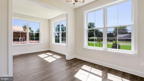 a view of entryway with wooden floor