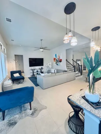 a living room with furniture and a table