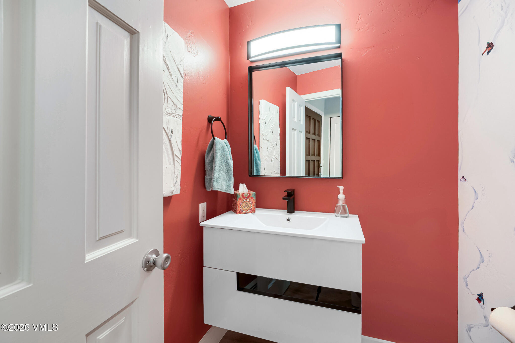 142 Eagle Drive, Unit C1 Avon, CO 81620 - Photo 16 of 20 a bathroom with a sink and a mirror