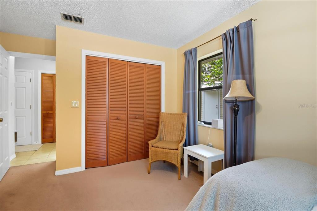 12550 Southwest 16th Avenue Ocala, FL 34476 - Photo 24 of 63 a bedroom with a bed and a window