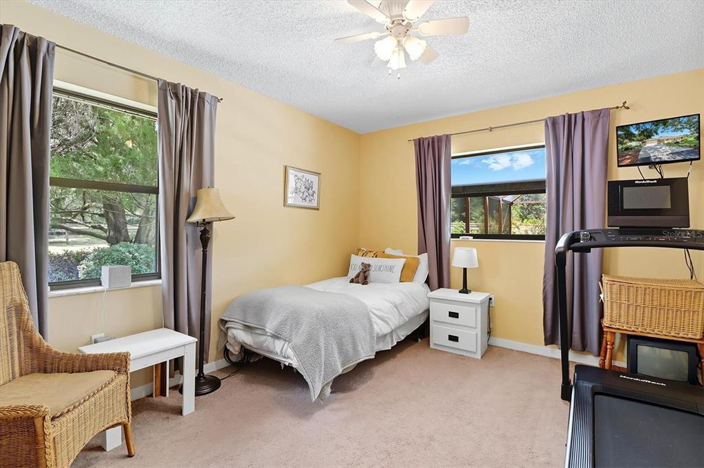 12550 Southwest 16th Avenue Ocala, FL 34476 - Photo 25 of 63 a bedroom with a bed and a window