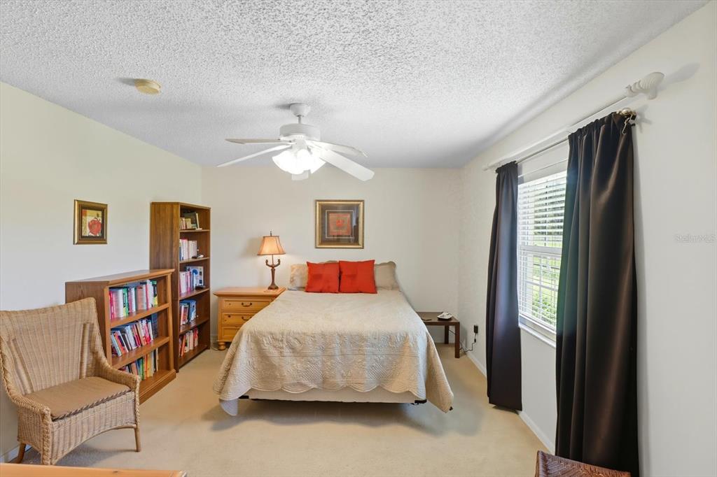 12550 Southwest 16th Avenue Ocala, FL 34476 - Photo 26 of 63 a bedroom with a bed furniture and a window
