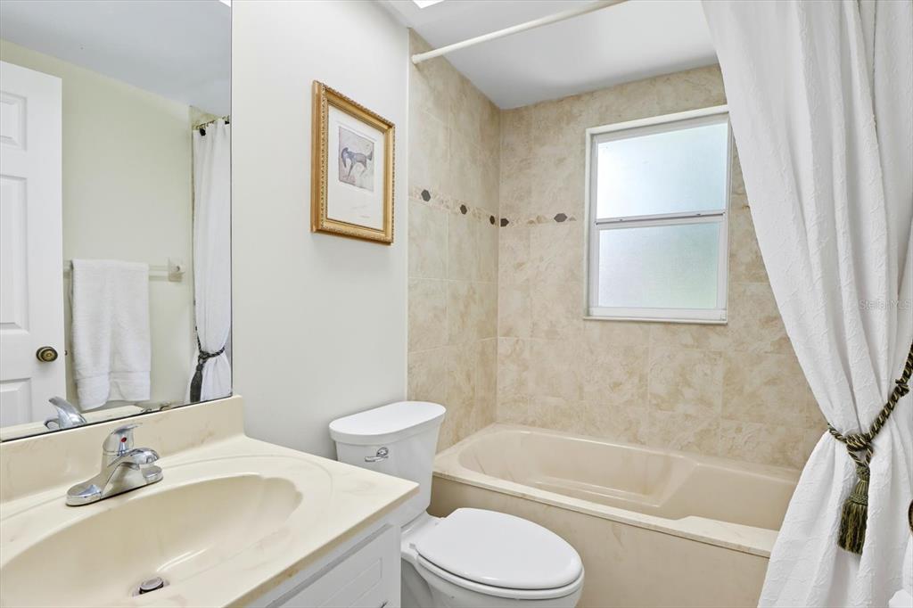 12550 Southwest 16th Avenue Ocala, FL 34476 - Photo 29 of 63 a bathroom with a sink toilet and shower