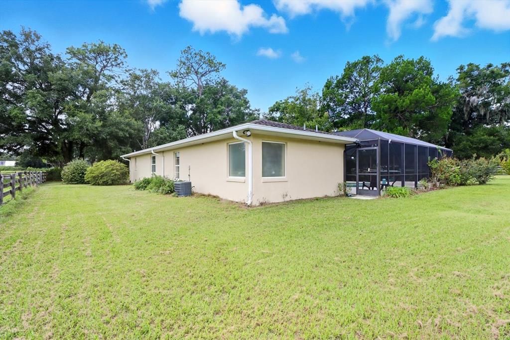 12550 Southwest 16th Avenue Ocala, FL 34476 - Photo 31 of 63 a view of a house with backyard and garden