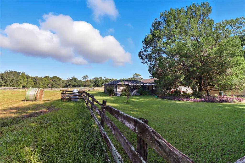12550 Southwest 16th Avenue Ocala, FL 34476 - Photo 38 of 63 a view of a lake with a yard