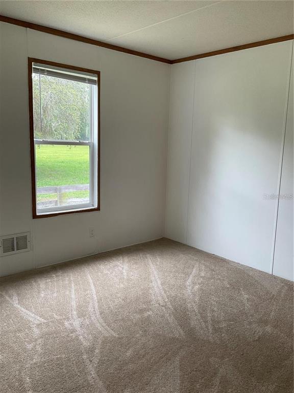 12550 Southwest 16th Avenue Ocala, FL 34476 - Photo 61 of 63 an empty room with a window