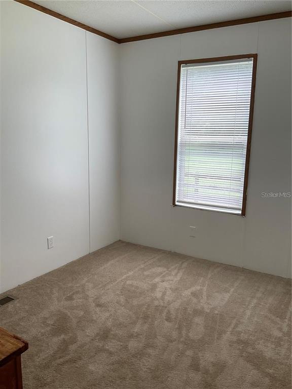 12550 Southwest 16th Avenue Ocala, FL 34476 - Photo 62 of 63 an empty room with a window