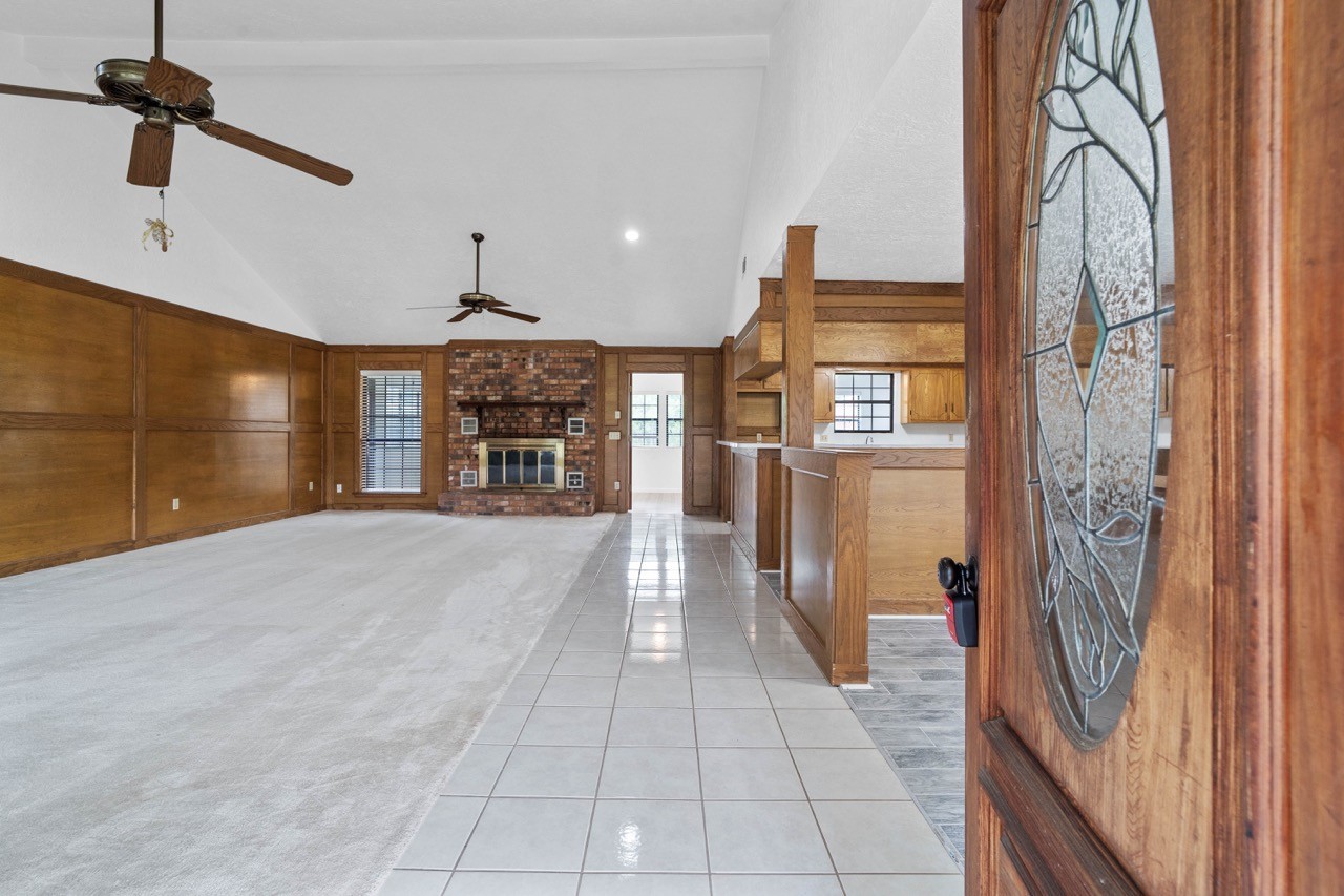 13180 Morgan Drive Splendora, TX 77372 - Photo 4 of 38 Come on in and tour this beautiful, well-built home boasting 2600sqft with 3 bedrooms, 2 bathrooms, sunroom and open concept living.