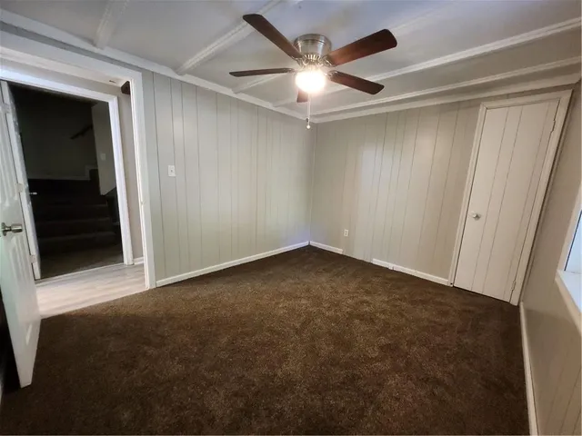 a view of a livingroom with wooden floor