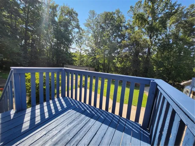 a view of backyard with green space