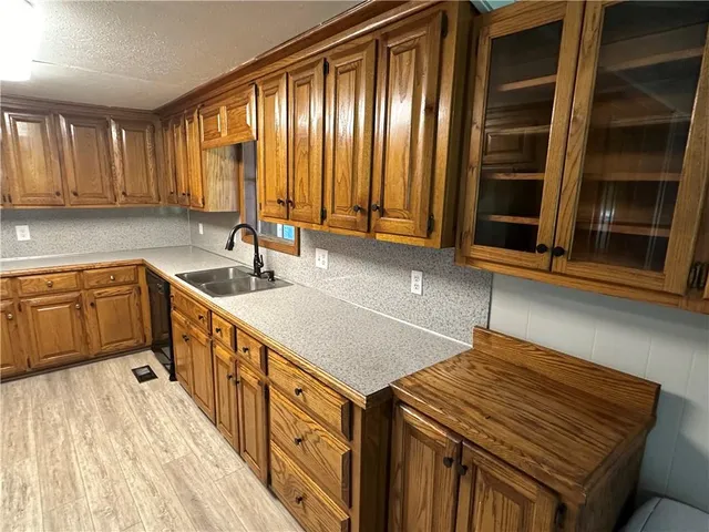 a view of an empty room with a ceiling fan