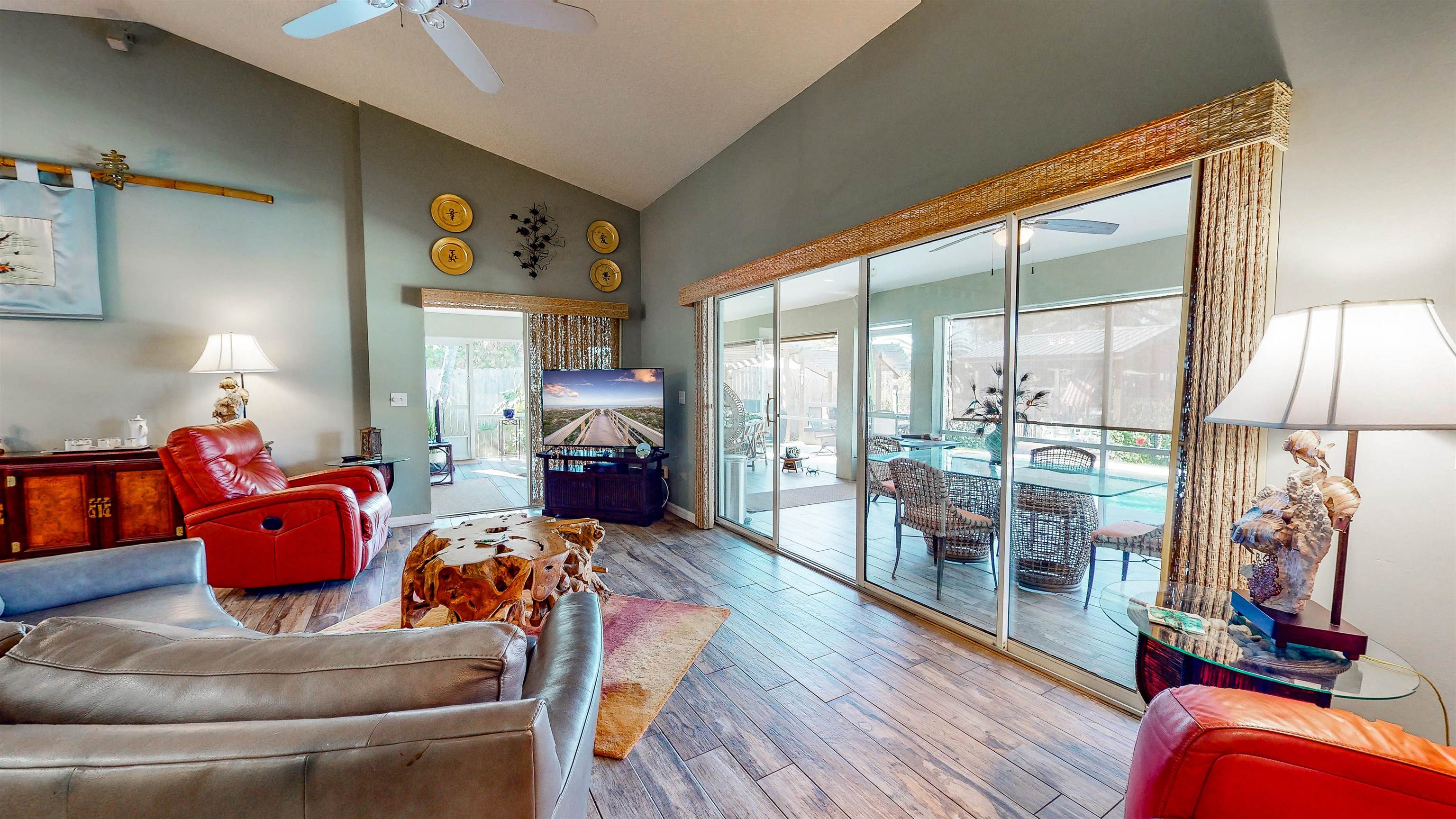 252 Desoto Road St. Augustine, FL 32080 - Photo 11 of 50 a living room with furniture and a floor to ceiling window