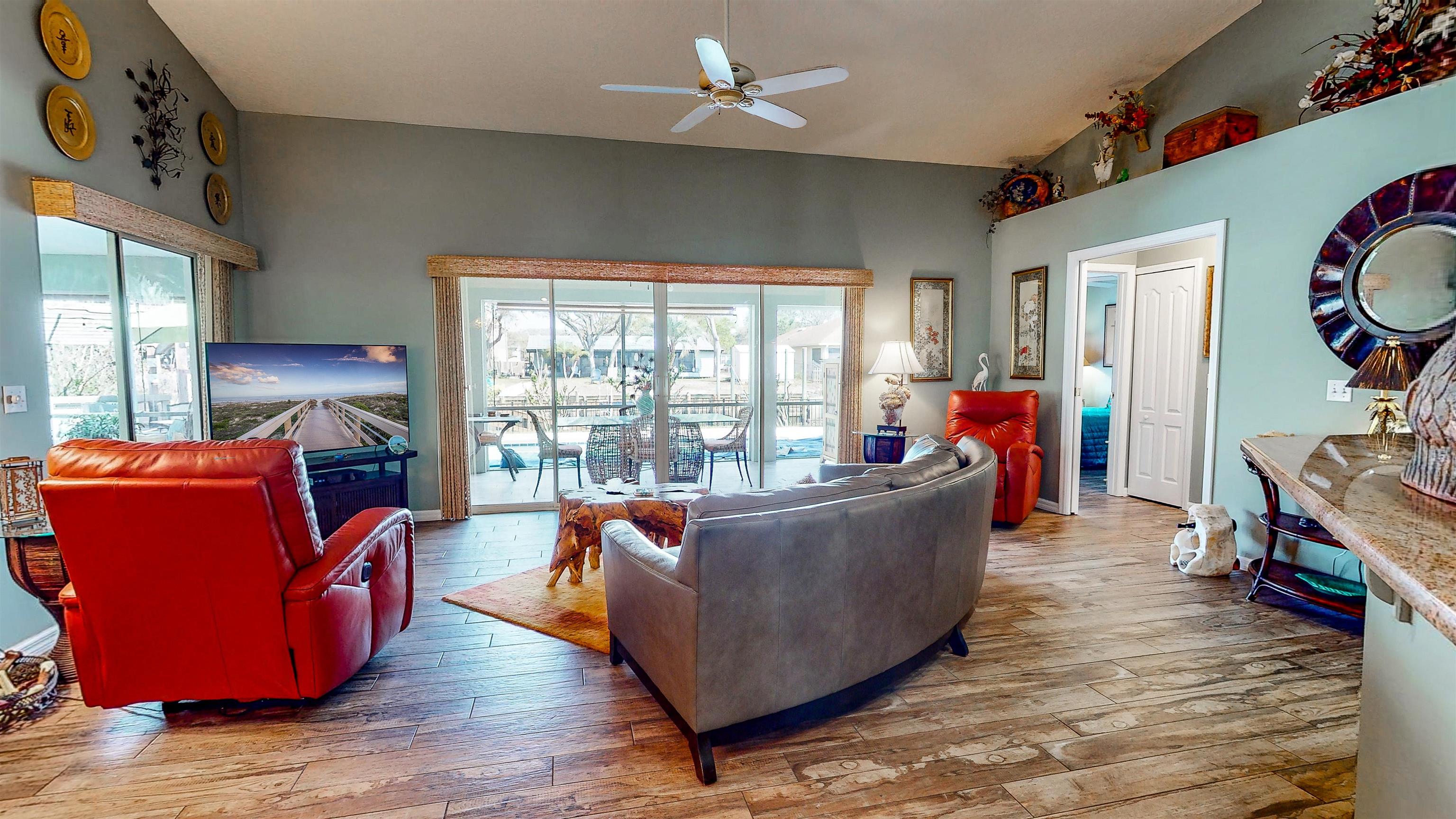 252 Desoto Road St. Augustine, FL 32080 - Photo 15 of 50 a living room with furniture and a large window