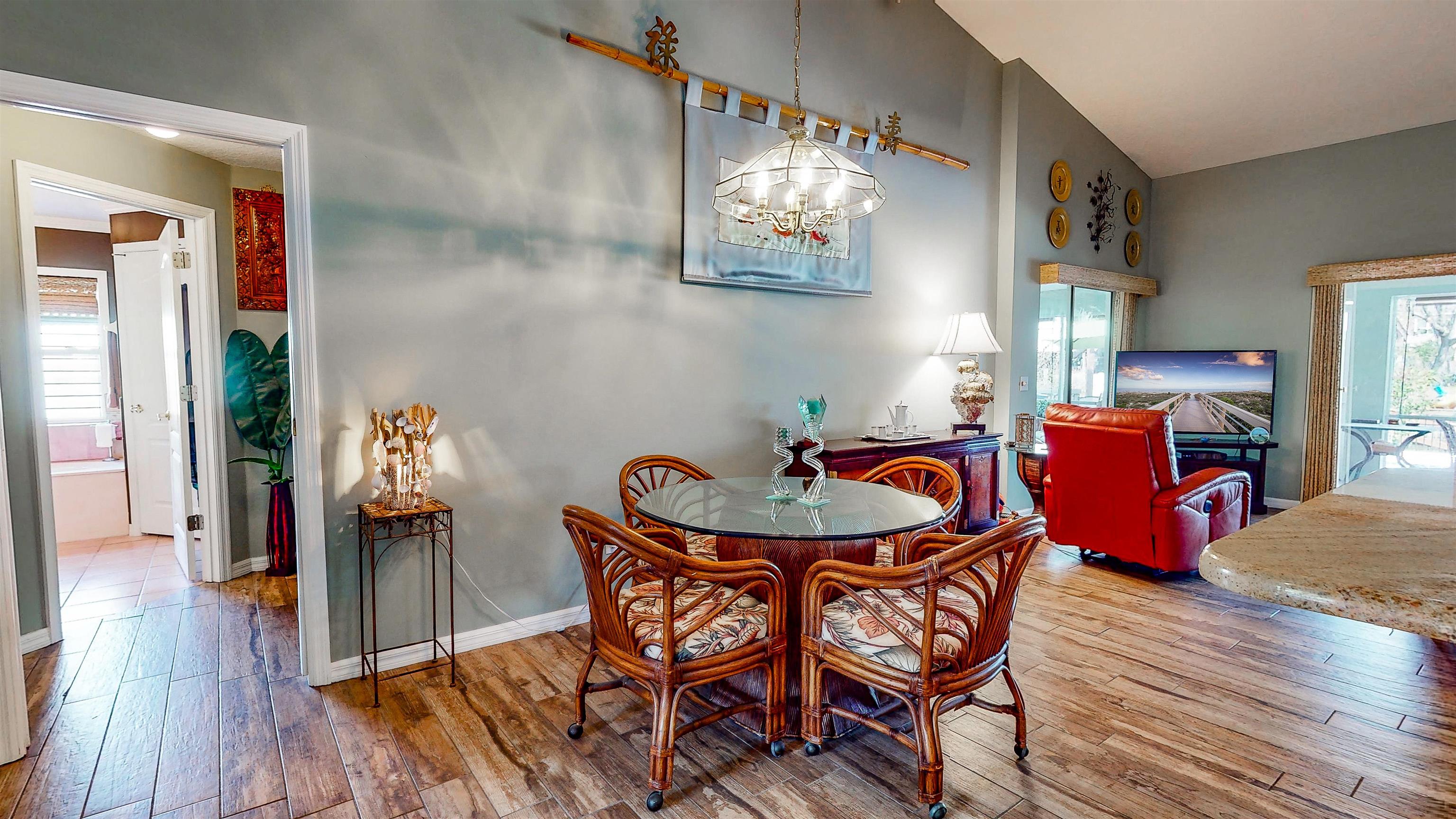 252 Desoto Road St. Augustine, FL 32080 - Photo 16 of 50 a dining room with furniture and wooden floor