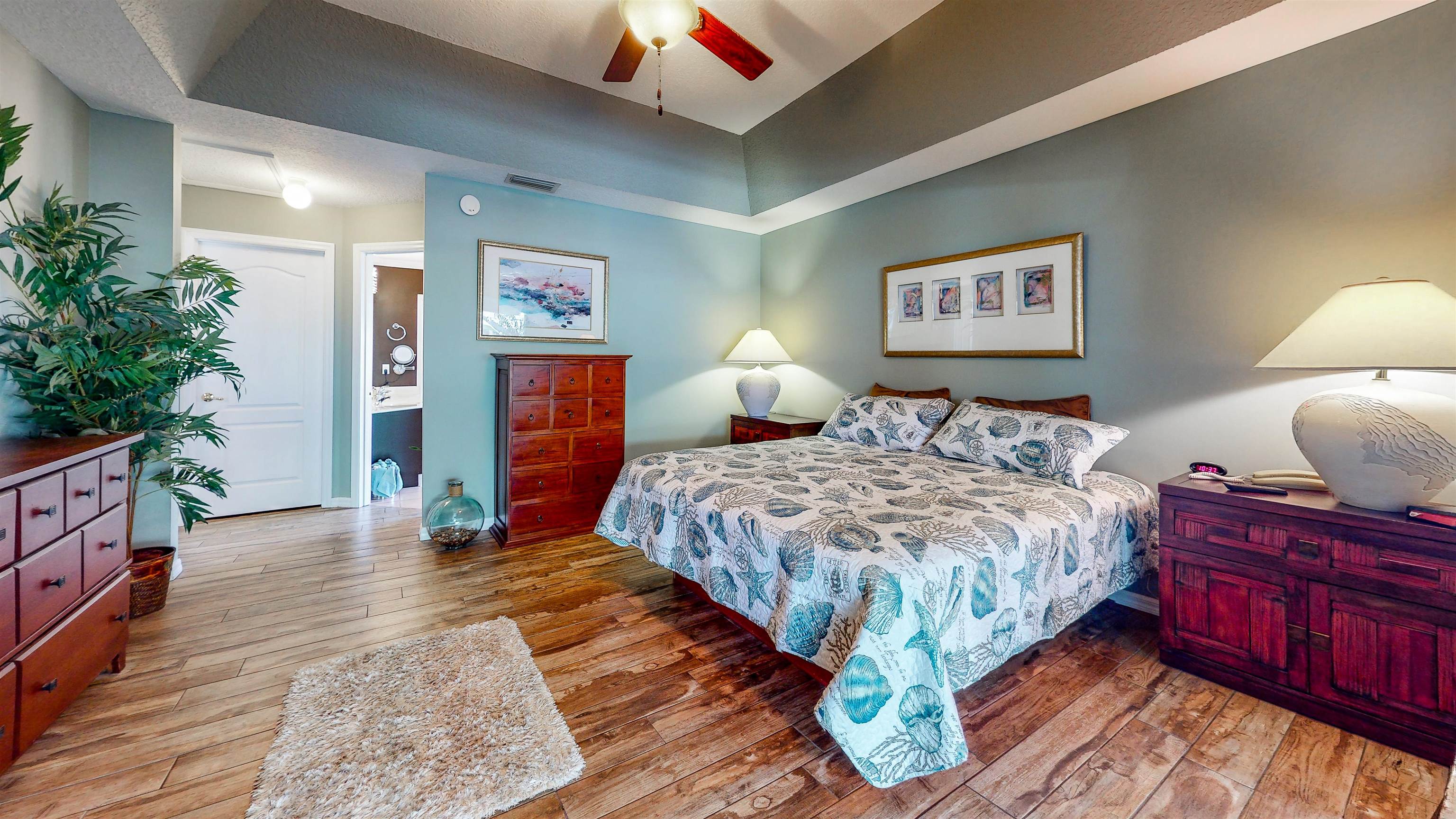 252 Desoto Road St. Augustine, FL 32080 - Photo 24 of 50 a bed sitting in a bedroom next to a window
