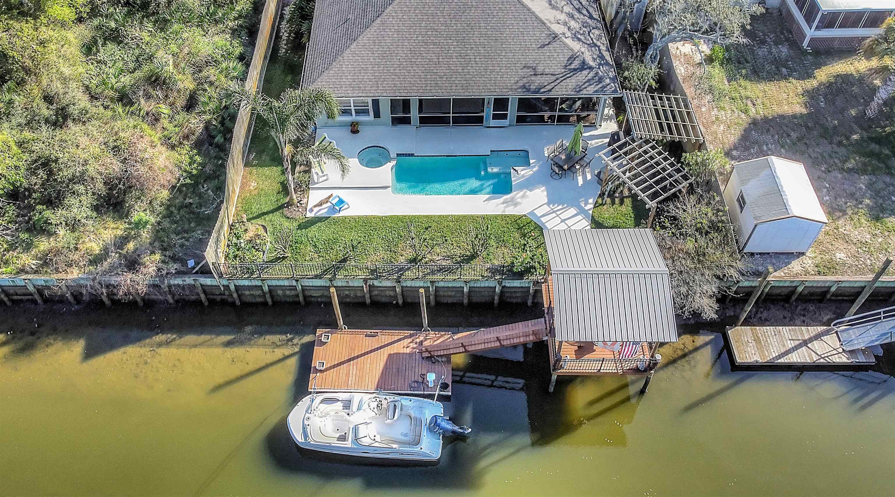 252 Desoto Road St. Augustine, FL 32080 - Photo 3 of 50 an aerial view of a house with swimming pool having outdoor seating