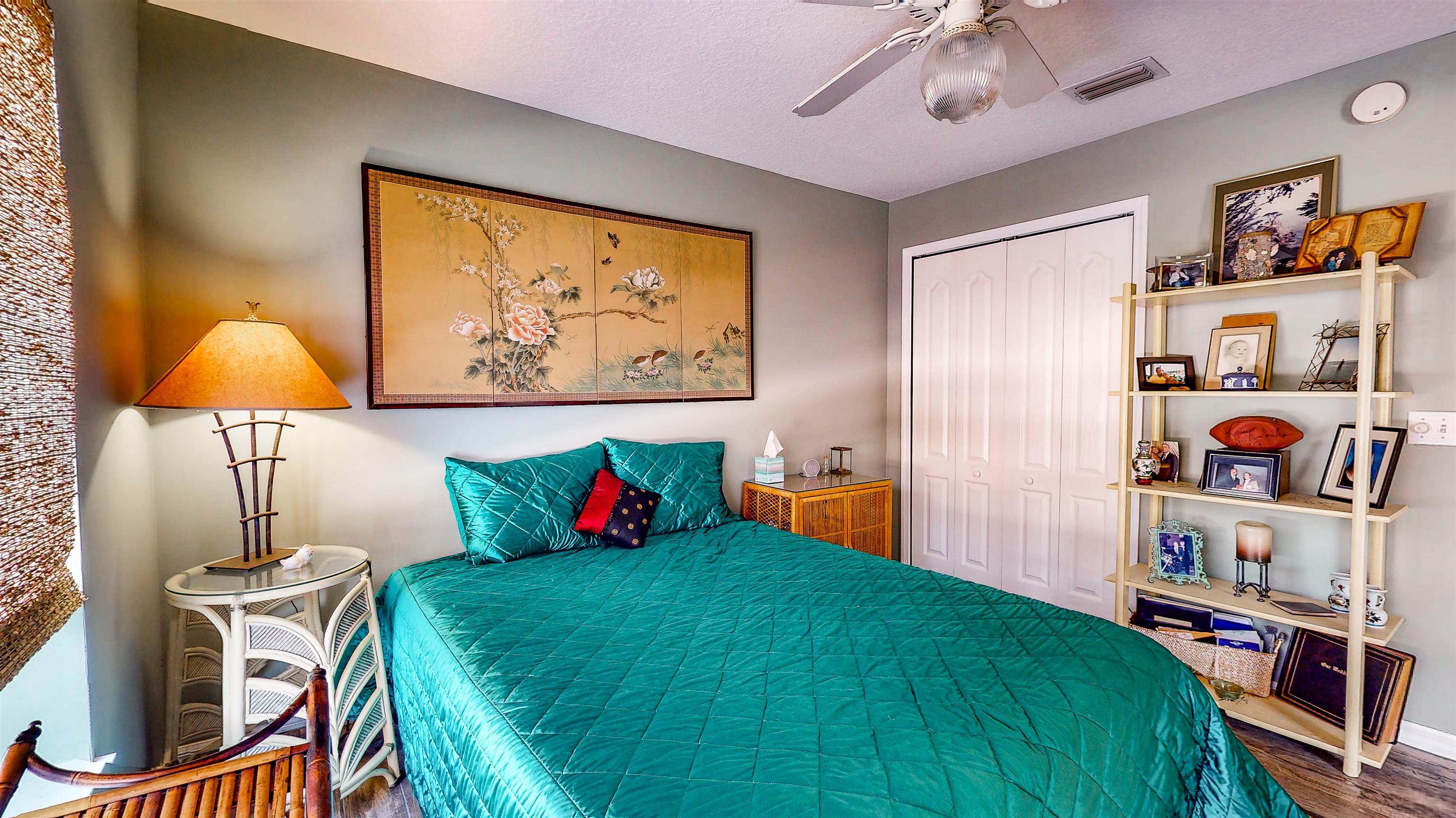 252 Desoto Road St. Augustine, FL 32080 - Photo 36 of 50 a bed room with a bed and a painting on the wall
