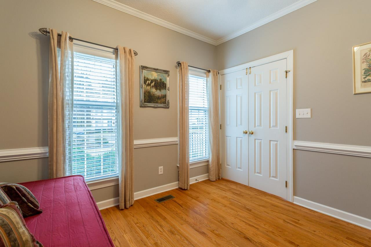 5409 Ingate Way Raleigh, NC 27613 - Photo 19 of 25 Direct access to full bath. Hardwood Floors. Crown molding and chair rail....lovely custom touches! 1st Floor Bedroom - Bedroom #4