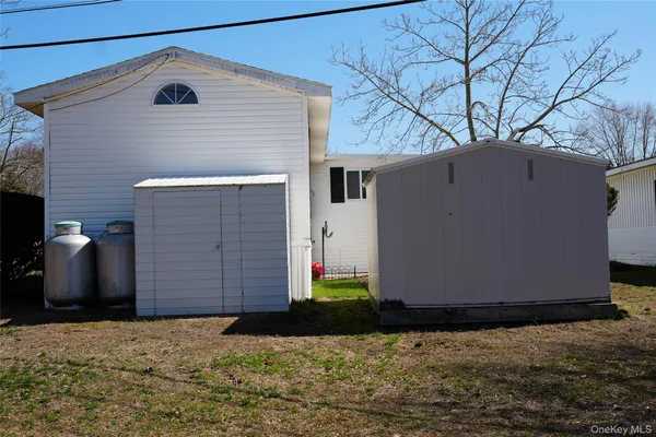 a view of a back yard of the house