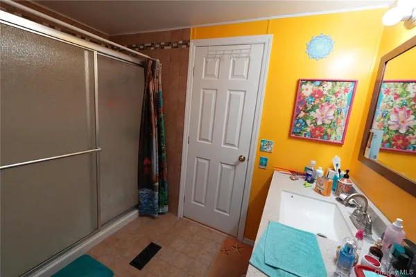 a view of front door with wooden floor