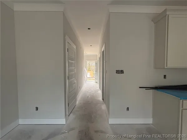a view of empty room with windows