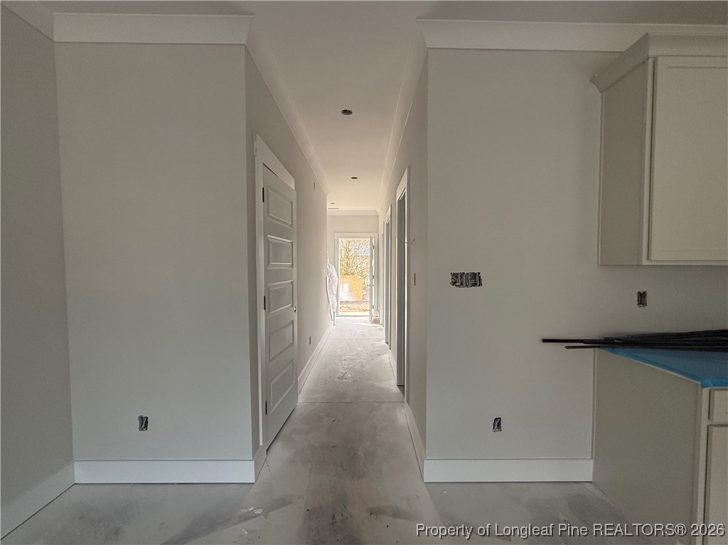 3929 Hamilton Street Hope Mills, NC 28348 - Photo 12 of 26 a view of a hallway with wooden floor